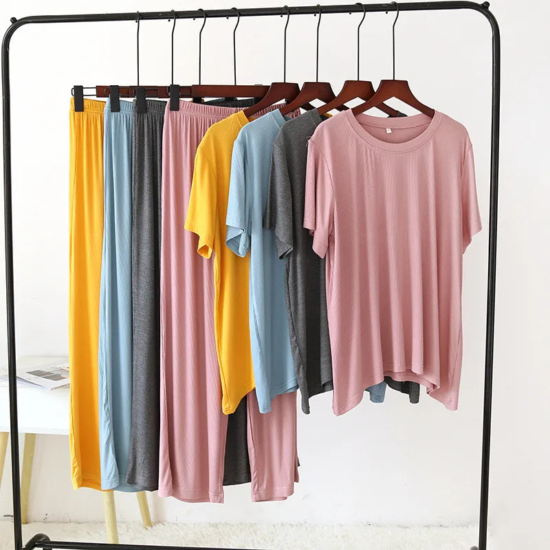 Spring and summer, new ladies pajamas short sleeves + trousers two-piece modal thin ,loose large size solid color home wear suit